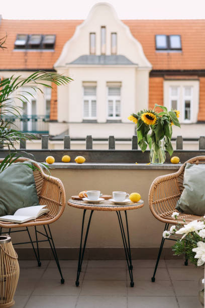 istock Selective focus on cozy place for rest on opened balcony with view on building. 2147581841
