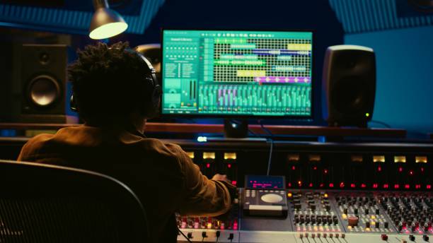 istock Audio designer leveling sound on a mixer control desk 2147582771