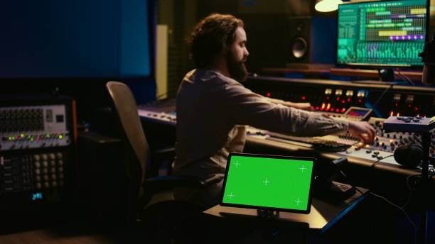 istock Sound designer processing and recording tracks in control room 2147582793