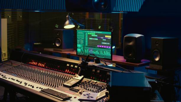 istock Empty control room filled with buttons and sliders used for recording 2147584428