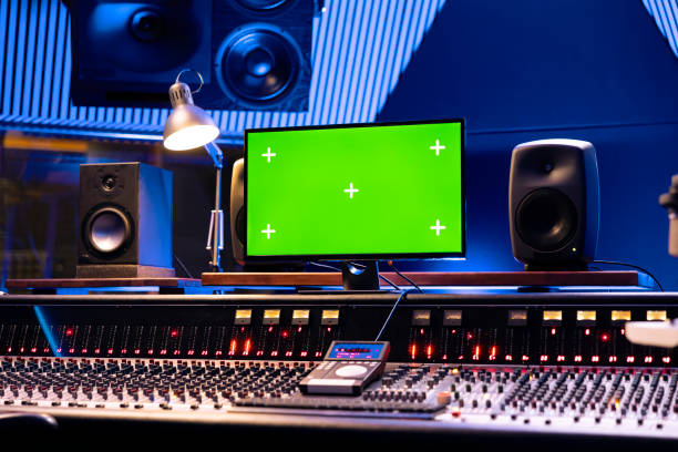 istock Empty control room with greenscreen on monitor and panel board 2147586363