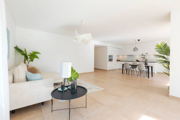 istock Open space with living room, kitchen and dining room together. inside a new, modern flat. 2147587670