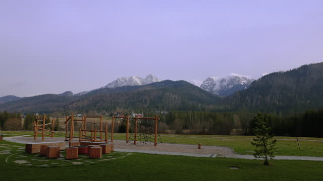 Beautiful Meadow with Background View of Snowcapped Tatra Mountains