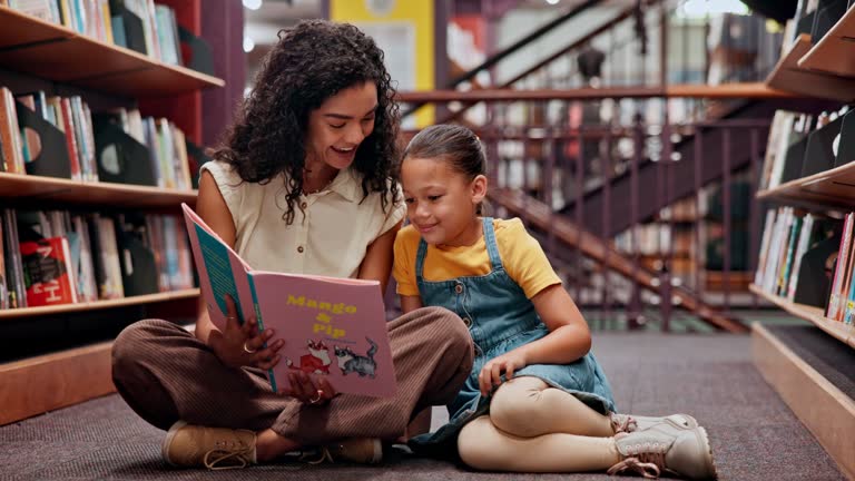 Woman, kid and book for library, support and reading for future growth and knowledge. Teacher, child and smile with help, development and english education for creativity and fantasy storytelling