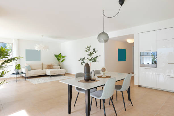 Large dining room and large living room. All in the same space.  Nice marble table with four chairs. Very warm and cosy space.