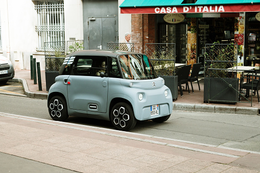 Toulouse, France - 29 March, 2024: A Citroen Ami compact electric car in a city street