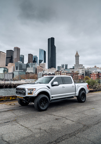 Seattle, WA, USA
April 8, 2024
2018 Ford Raptor parked with the Seattle skyline in the background