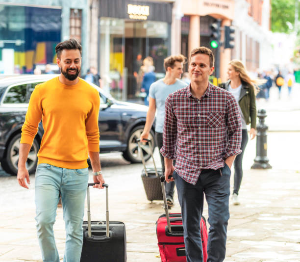 A group of friends arriving in London together for a weekend break.