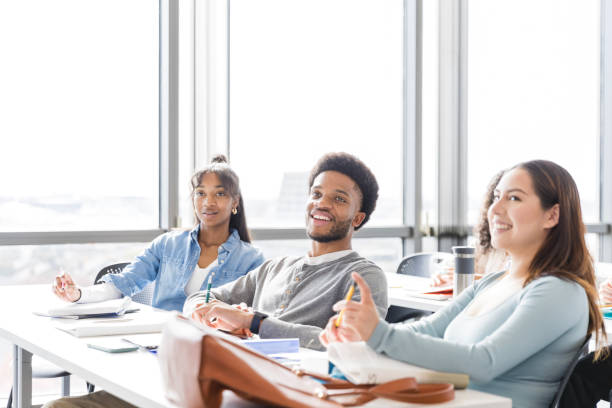 istock Diverse group of students enjoy attending class on campus 2147592200