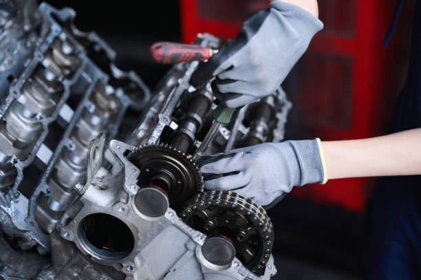 istock Master uses special tools to repair engine of modern car 2147592958