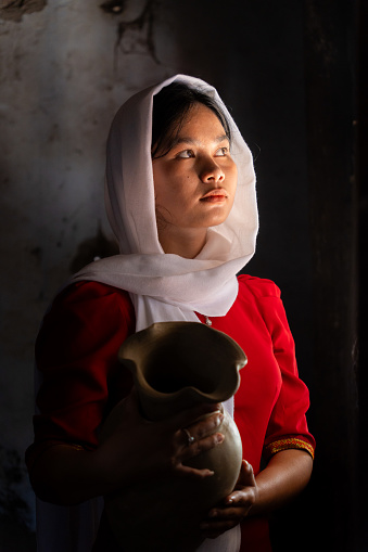 portrait of Cham ethnic girl in Bau Truc pottery village, Phan Rang city, Ninh Thuan province, Vietnam. People and travel concept.