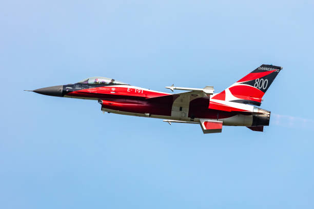 royal danish air force lockheed f-16 fighting falcon fighter jet plane flying. aviation and military aircraft. - general dynamics f 16 falcon fighter plane military airplane air force photos et images de collection
