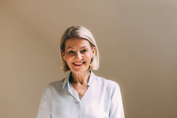 istock Mature Woman Smiling Confidently in Her Home Setting 2147595380