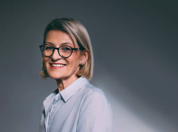istock Confident Professional Woman Smiling in Studio Portrait 2147595485