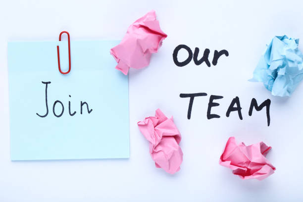 istock Text Join Our Team with crumpled papers on white background 2147597210