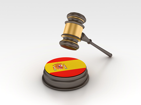 Spanish Flag with Legal Gavel - Gray Background - 3D Rendering
