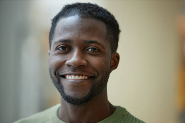 istock Black Man with Blurred Background in Green 2147598839