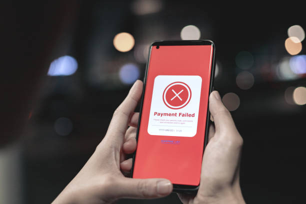 istock Payment failed, declined. Red online financial transaction notification in application showing error on smartphone. 2147600596