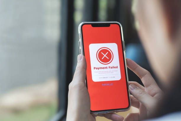 istock Payment failed, declined. Red online financial transaction notification in application showing error on smartphone. 2147600611