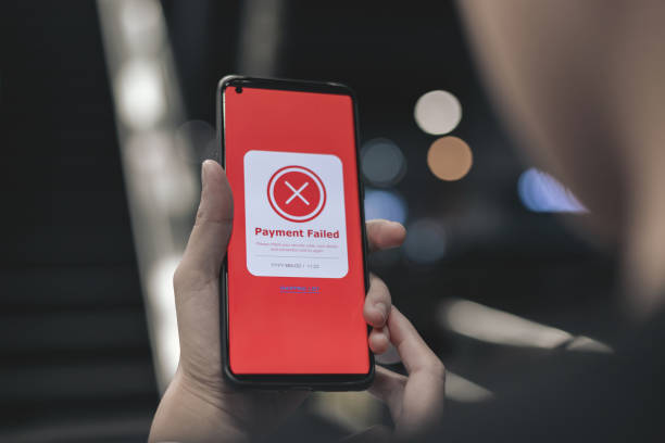 istock Payment failed, declined. Red online financial transaction notification in application showing error on smartphone. 2147600628