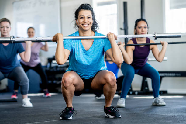 istock Women Weight Lifting 2147602167
