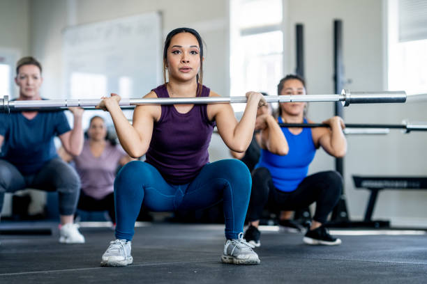 istock Women Weight Lifting 2147602172