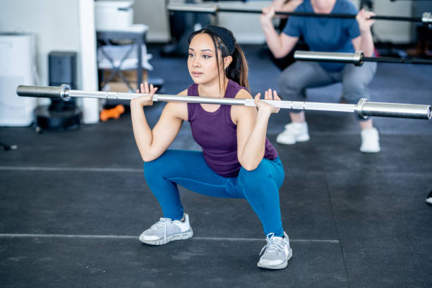 istock Women Weight Lifting 2147602180