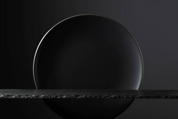 istock Black stone podium and black circle ceramic plate for luxury product placement. 2147602931