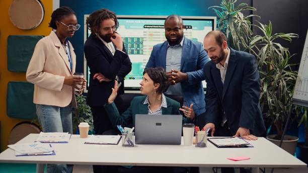 istock Employees team showing their project updates to the supervisor 2147603061