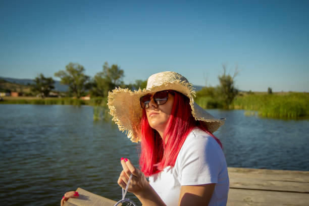 Woman is hanging dreamcatcher