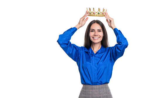 Business success and reward. Successful leadership leading business to success. Ambitious businesswoman in formalwear and crown. Successful businesswoman with crown. Copy space.