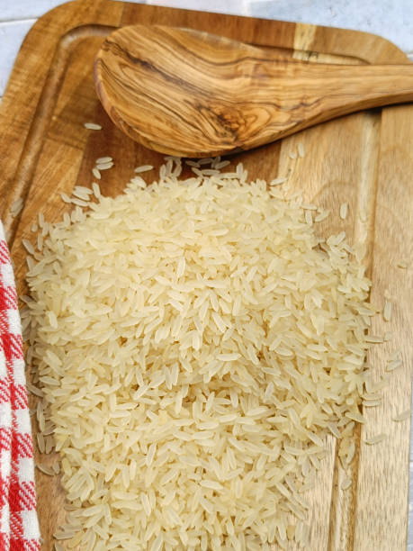 istock pile of round rice, close-up, on a table 2147613568