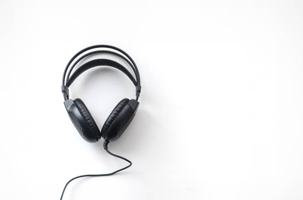Headphone on wooden plank background