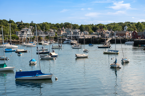 Rockport, USA - August 11, 2019:Rockport town houses near the harbor during a sunny day