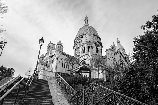 Paris, France - April 6th, 2024: Sacre Coeur with stairs at Paris, France