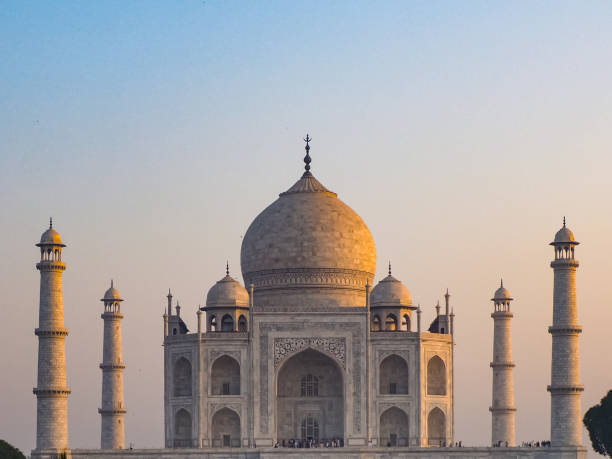 istock Taj Mahal Against a Peach Sunrise Sky 2147627905