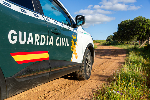 Badajoz, Spain. April 8, 2024. Civil Guard car on a dirt road. SEPRONA. Surveillance of agricultural or livestock farms.