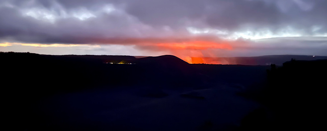 Watching the lava glow become visible from miles away as the sun sets