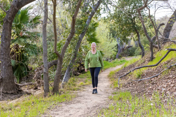 istock Woman walking on a nature trail 2147633395