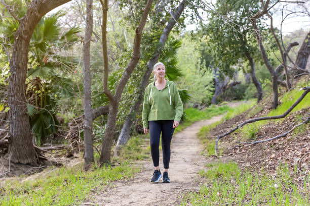 istock Woman walking on a nature trail 2147633411