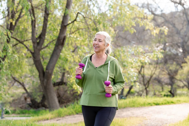 istock Woman walking on a nature trail 2147633504