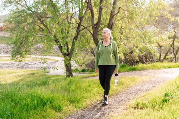 istock Woman walking on a nature trail 2147633544