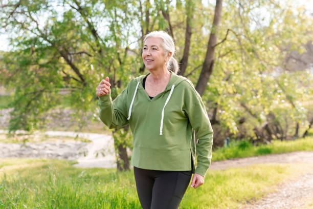 istock Woman walking on a nature trail 2147633547
