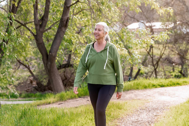 istock Woman walking on a nature trail 2147633550
