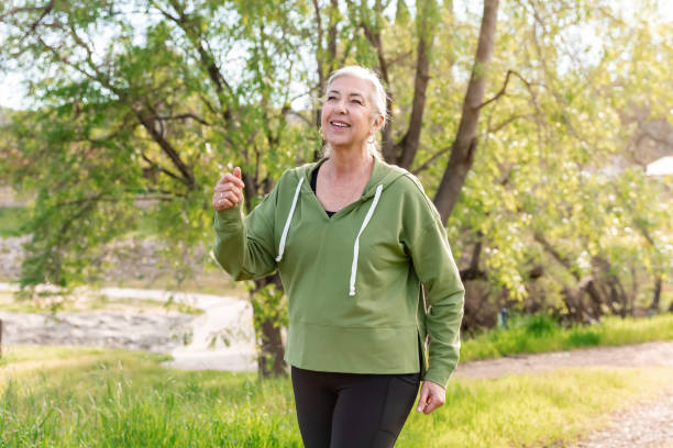 istock Woman walking on a nature trail 2147633552