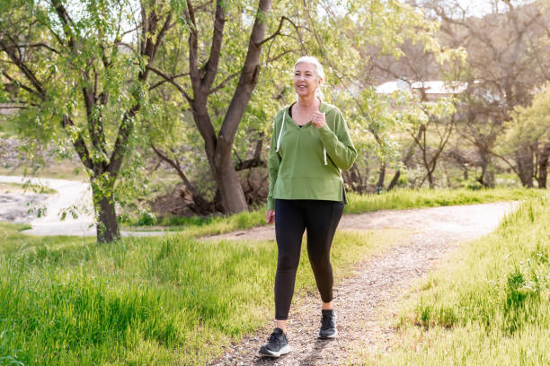 istock Woman walking on a nature trail 2147633557