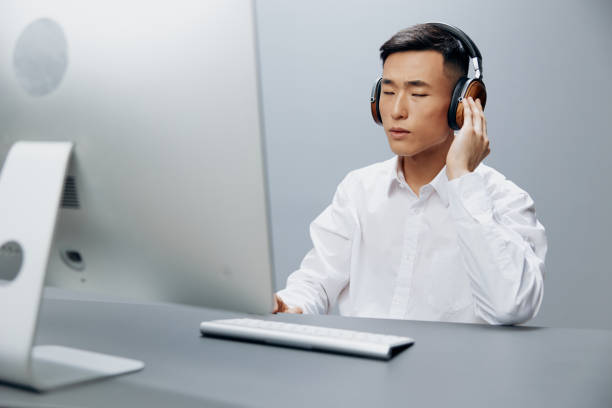 istock businessmen computer with keyboard on desk in office internet isolated background 2147633624