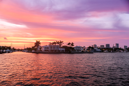 Fort Lauderdale, Florida - March 23, 2024: Sunset views from the water along the canals of Fort Lauderdale, Florida