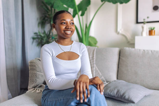istock Serene young black woman relaxing at home 2147634634