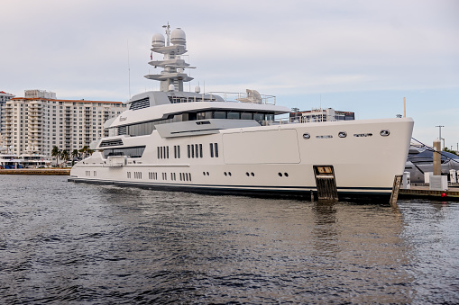 Fort Lauderdale, Florida - March 23, 2024: The super yacht Elysian, owned by John Henry, owner of the Boston Red Sox, docked along the canals of Fort Lauderdale, Florida